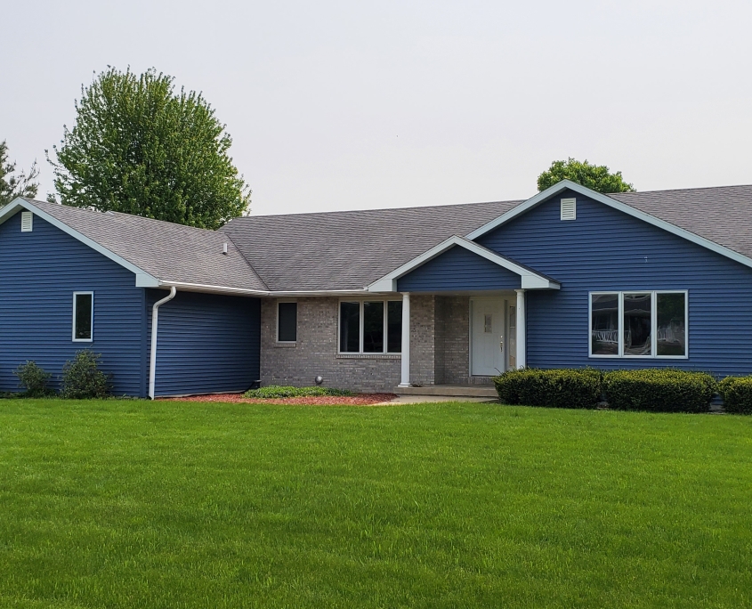 Paramout Roofing and Siding Installed Mastic Newport Bay Blue Vinyl siding on this 3065 Saddle Brooke-Trail-Sun-Prairie-Wisconsin home