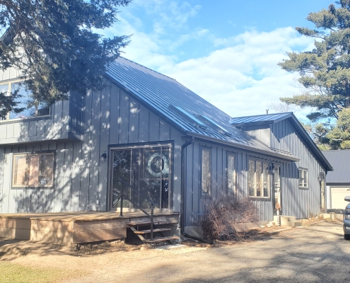 Paramount Roofing Cambridge, WI Rolled Standing Seam Black Metal Roof